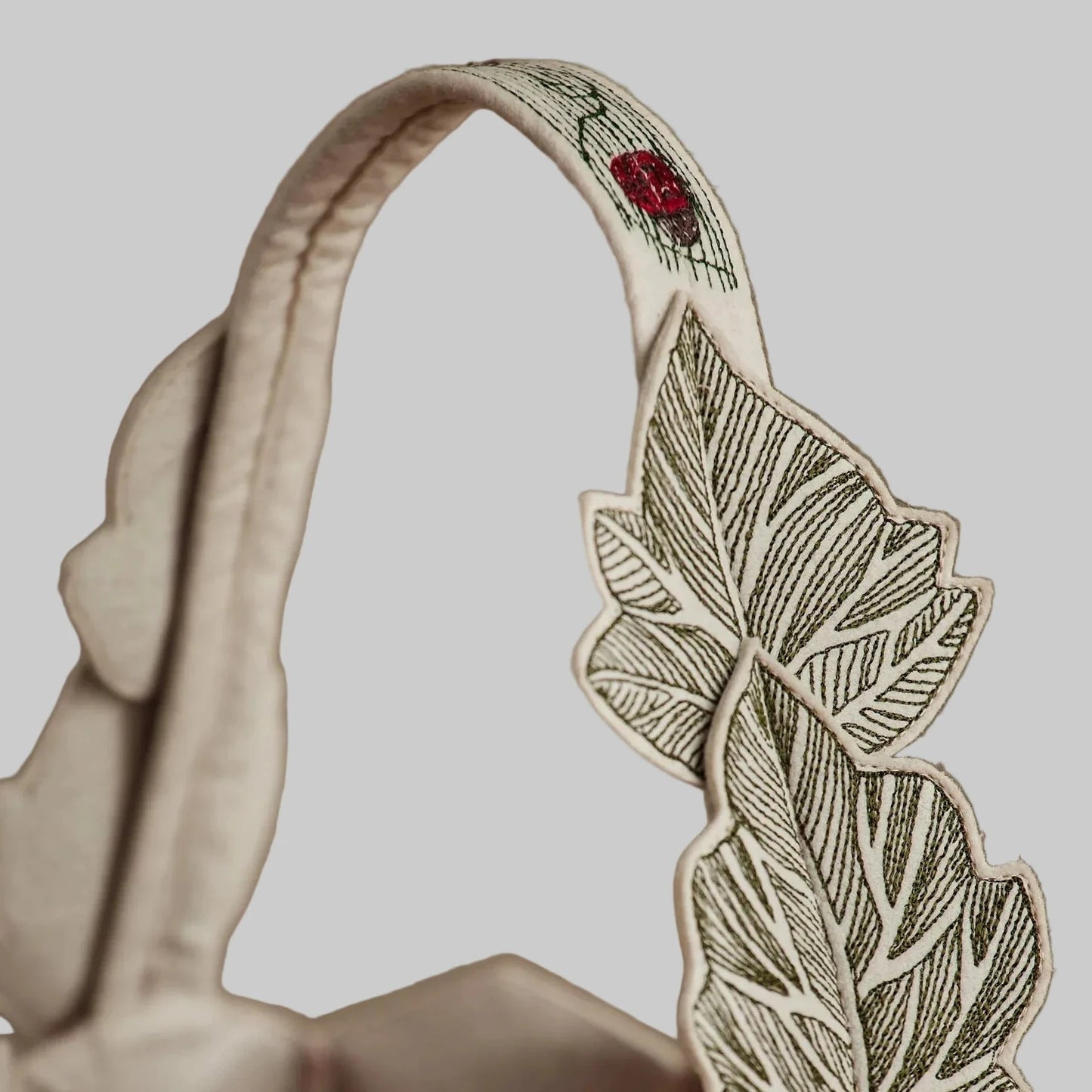 Coral and Tusk’s “Jack-o’-Lantern” embroidered felt basket for Halloween decor or trick-or-treating