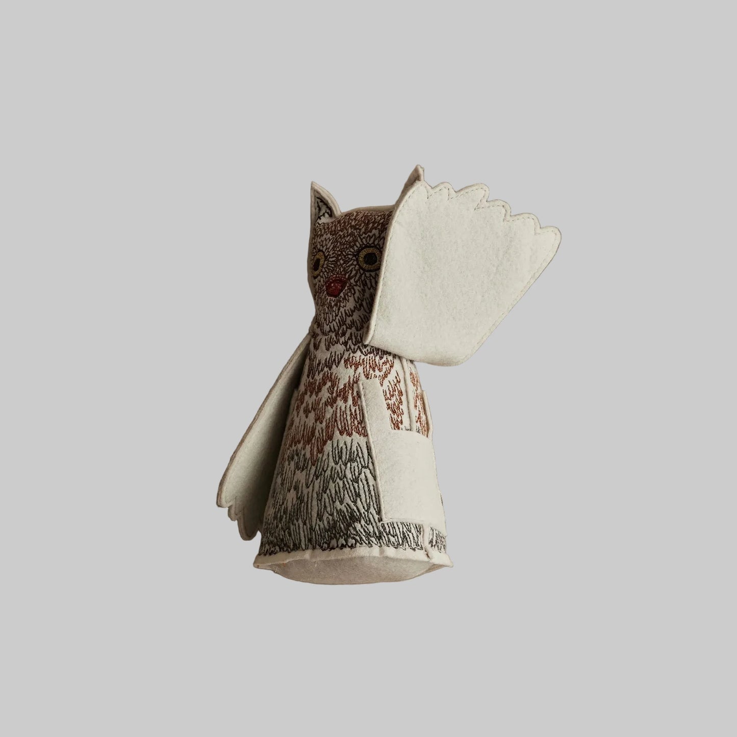 Coral and Tusk’s “Owlet of Curiosity” embroidered felt object, keepsake of gift