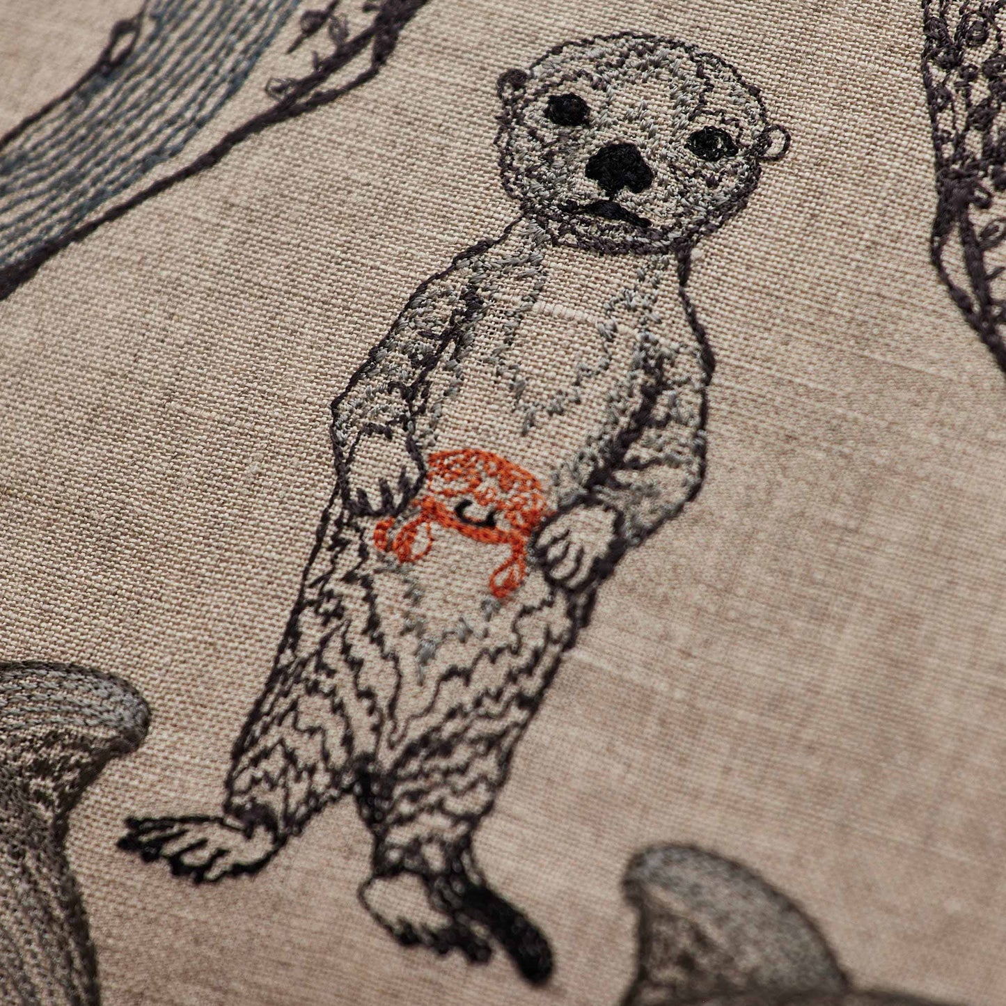Coral and Tusk’s “Sea Friends” embroidered linen pillow featuring a variety of marine life found in oceans across the world, measures 16” x 16”