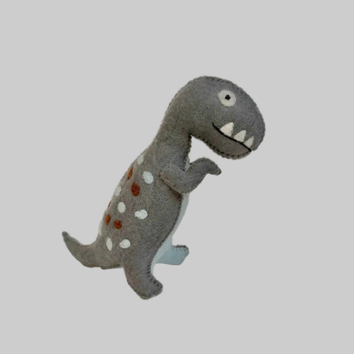 The Winding Road’s wool-felted gray t-rex dinosaur, fair trade