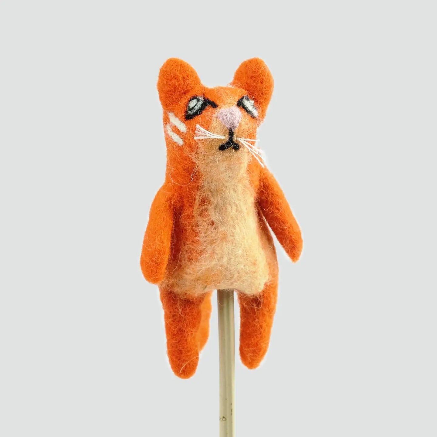 The Winding Road’s wool-felted orange tabby cat finger puppet