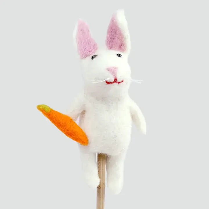 The Winding Road’s wool-felted white rabbit finger puppet holding a carrot