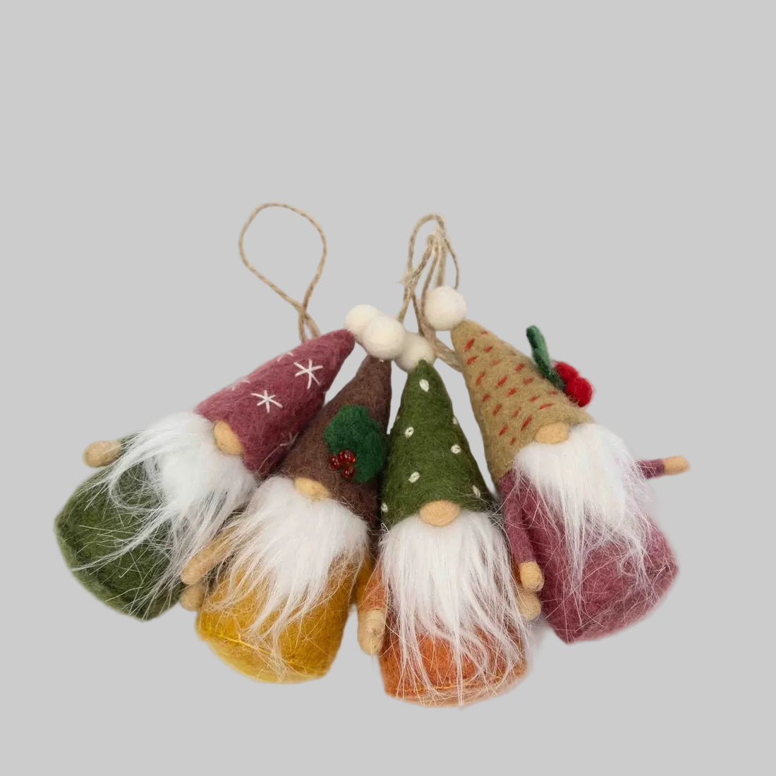 The Winding Road's wool-felted ornaments featuring gnomes with festive hats. Handmade and fair trade.