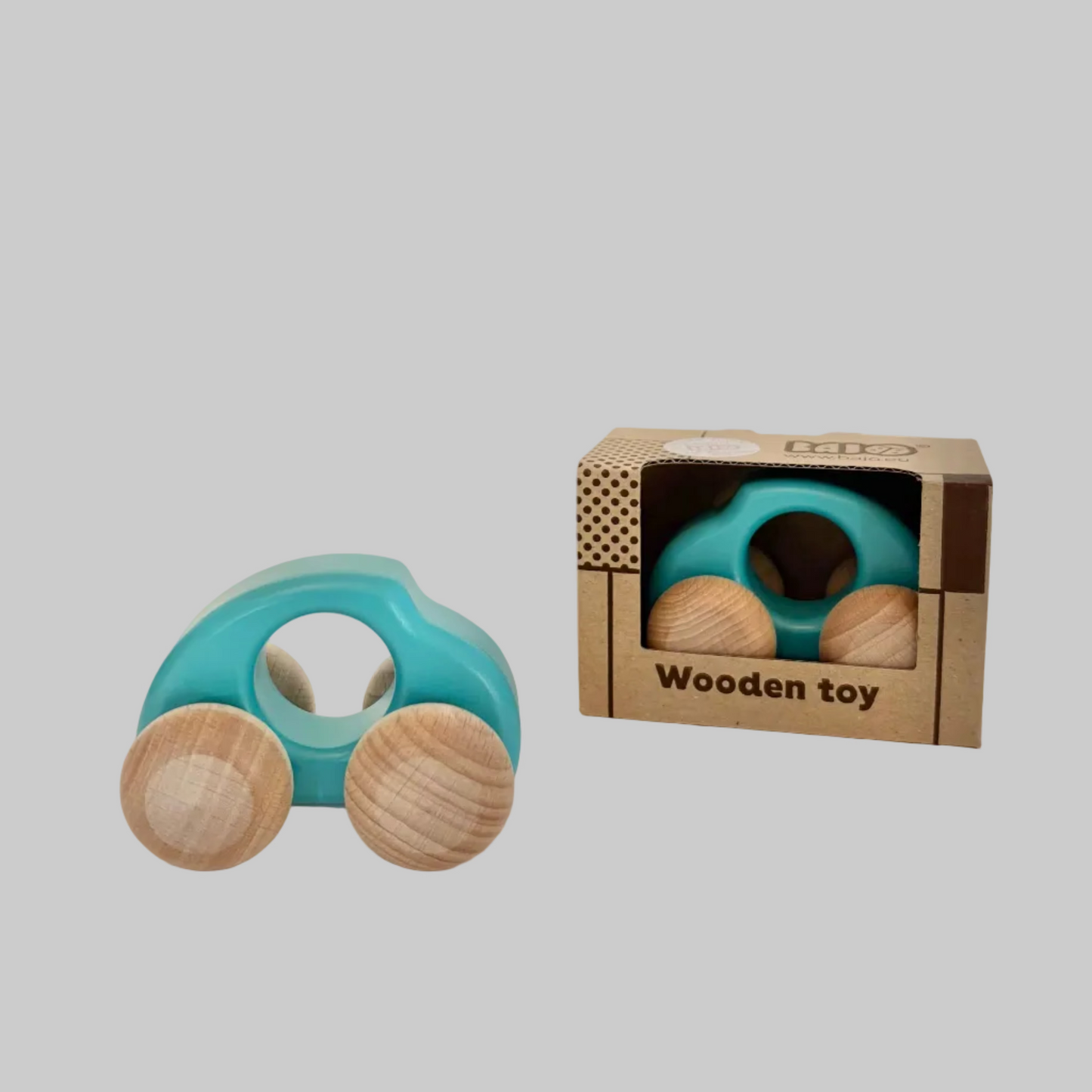Little Poland Gallery’s wooden toys featuring a teal vintage beetle car