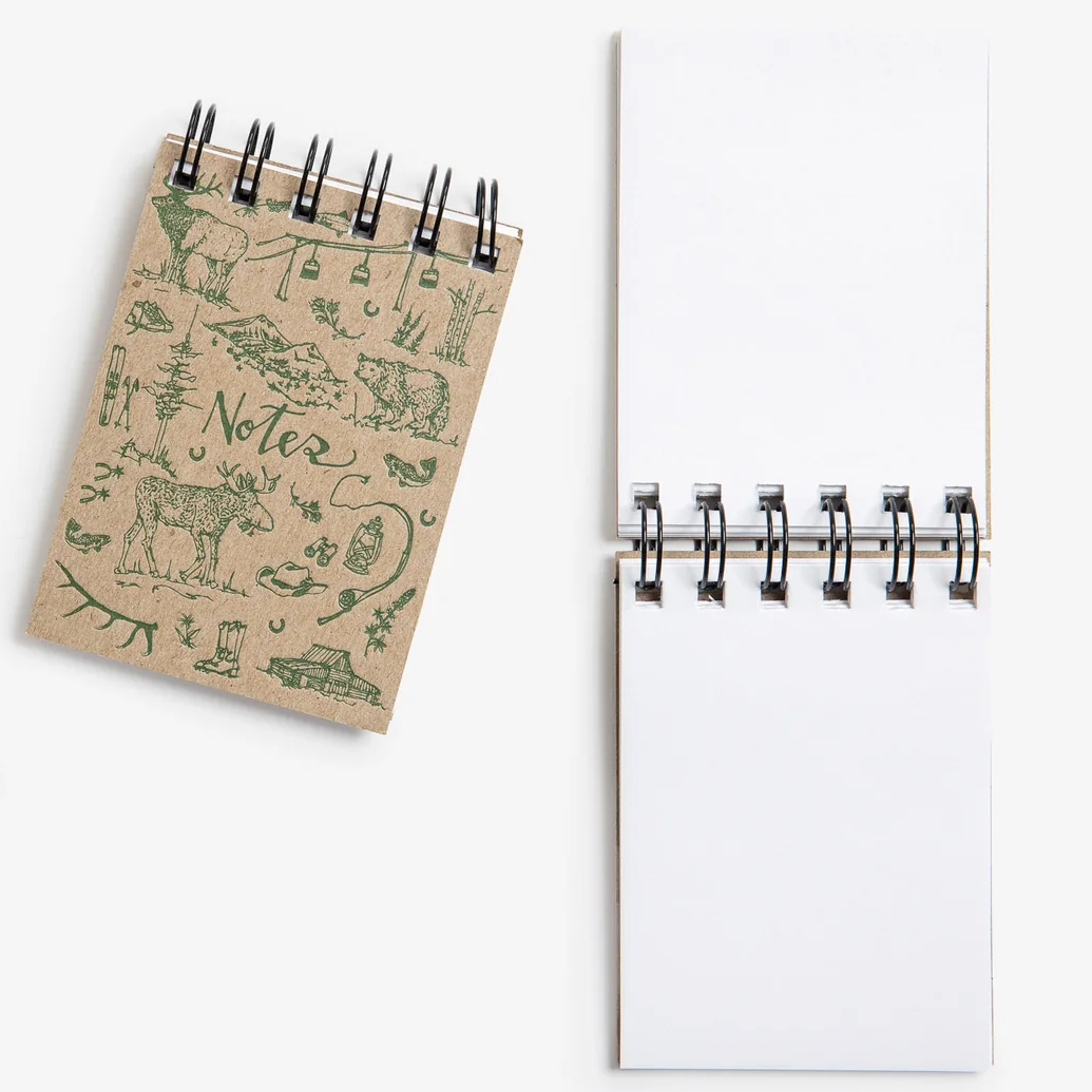 Two small spiral-bound notebooks with blank white pages