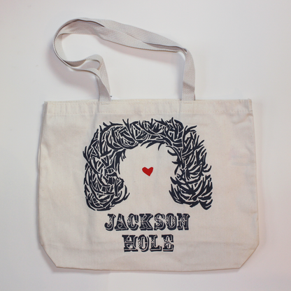 Canvas bag with screen printed antler arch design.