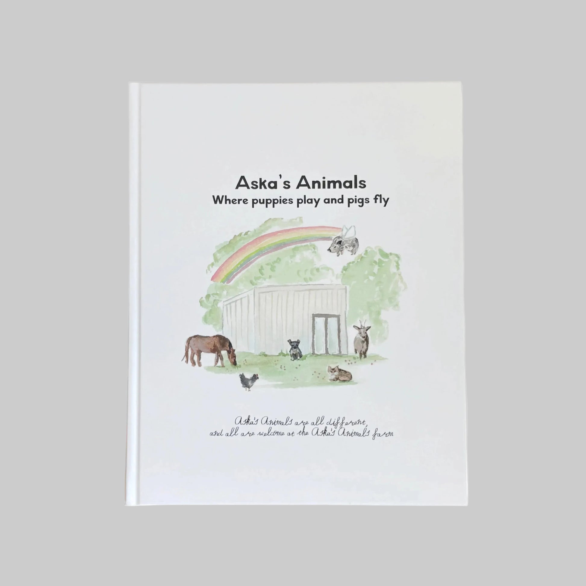 Book cover of 'Aska's Animals' with illustrations of animals and a rainbow