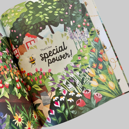 Colorful children's book open to a page with a garden illustration and text.