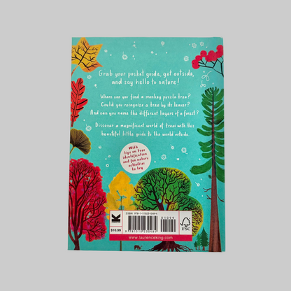 Book cover with colorful illustrations of trees on a blue background
