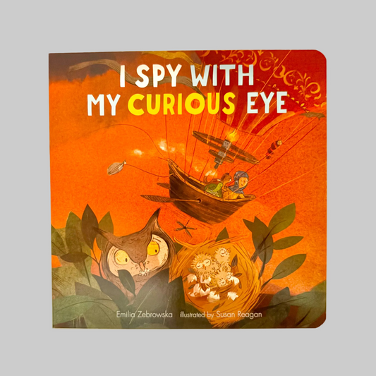 Book cover of 'I Spy with My Curious Eye' featuring an owl, ship, and airplane on an orange background.