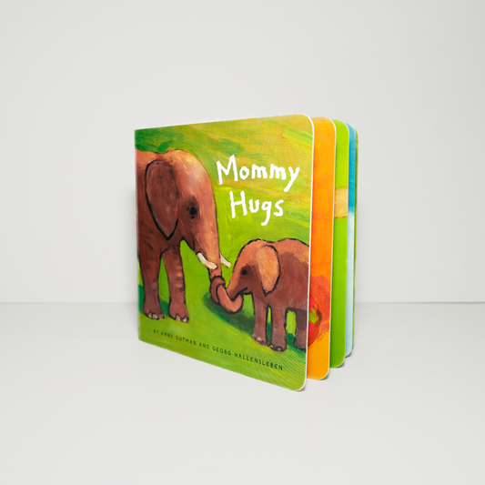 A board book titled 'Mommy Hugs' with colorful illustrations of baby animals and their mothers.