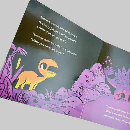 Children's book open to a page with dinosaur illustrations and text.