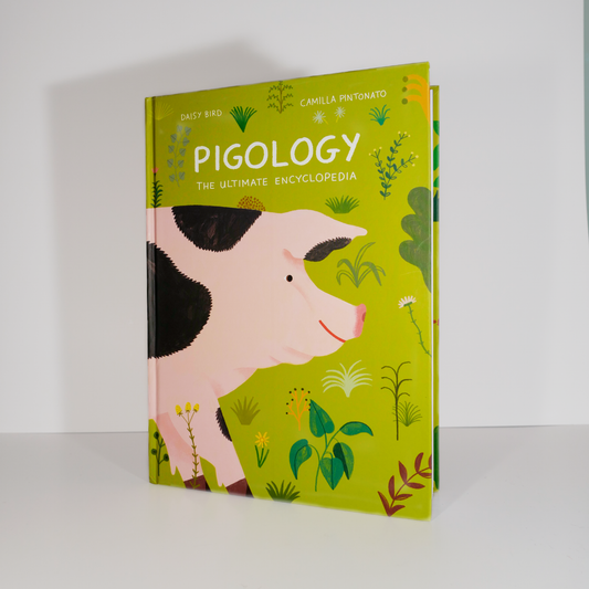 A children's encyclopedia titled 'Pigology - The Ultimate Encyclopedia' with an illustration of a pig on the cover, surrounded by greenery.