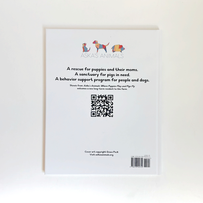Back cover of a book with text and QR code