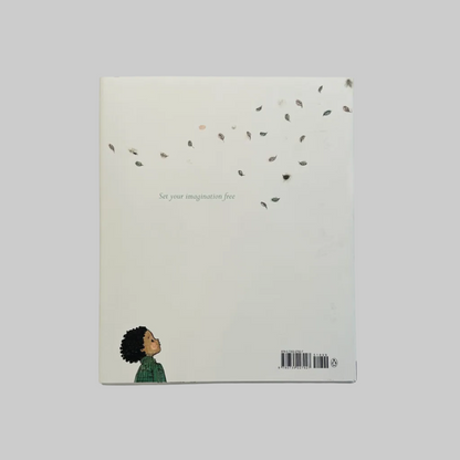 Back cover of a book with an illustration of a child watching feathers blow in the wind
