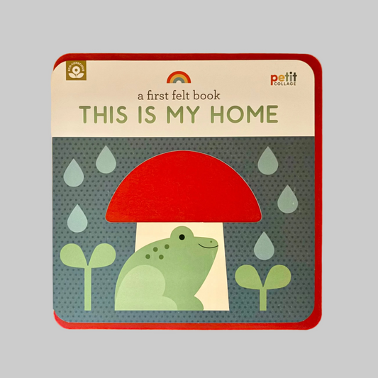 Children's book titled 'This is My Home' with a red mushroom and green frog illustration