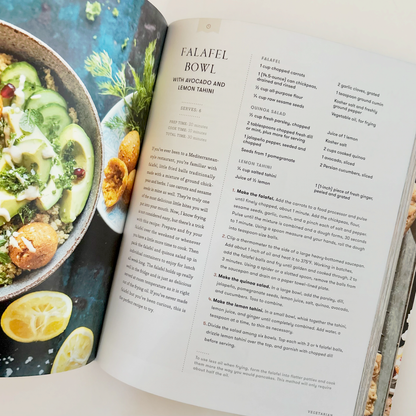 Open cookbook showing a recipe for Falafel Bowl with images of ingredients on the left page.