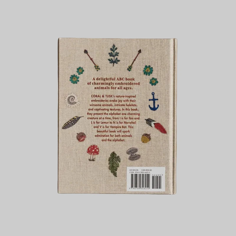 Back cover of a book with embroidered animal designs and text on a beige background, by Stephanie Housley of Coral and Tusk