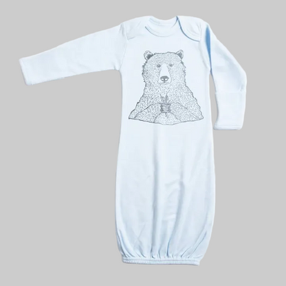 Bird and Buffalo’s baby gown in blue featuring bear holding flowers design, made locally in Jackson Hole, WY
