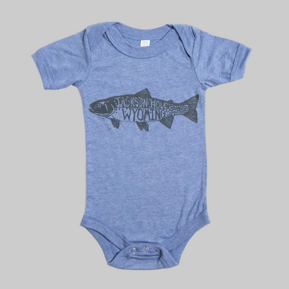 Bird and Buffalo’s baby onesie in blue with a trout fish design, made locally in Jackson Hole, WY
