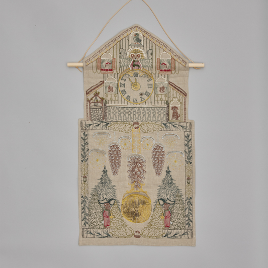 Coral and Tusk's "Christmas Clock" advent calendar featuring intricate embroidery and pockets for small gifts