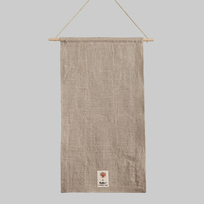 Coral and Tusk's "Holiday House" advent calendar featuring intricate embroidery and pockets for small gifts