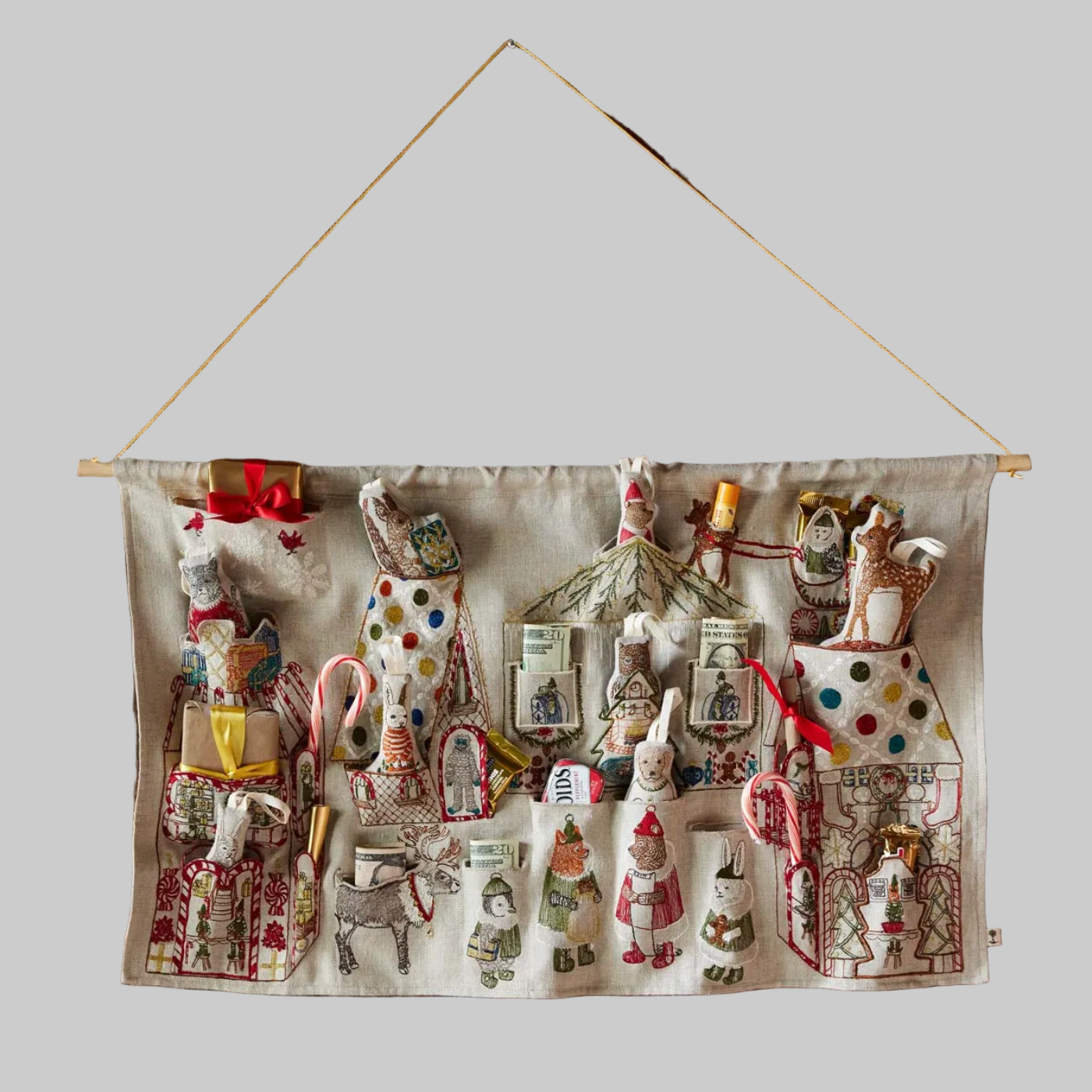 Coral and Tusk's "North Pole" advent calendar featuring intricate embroidery and pockets for small gifts