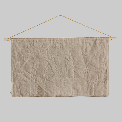 Coral and Tusk's "North Pole" advent calendar featuring intricate embroidery and pockets for small gifts