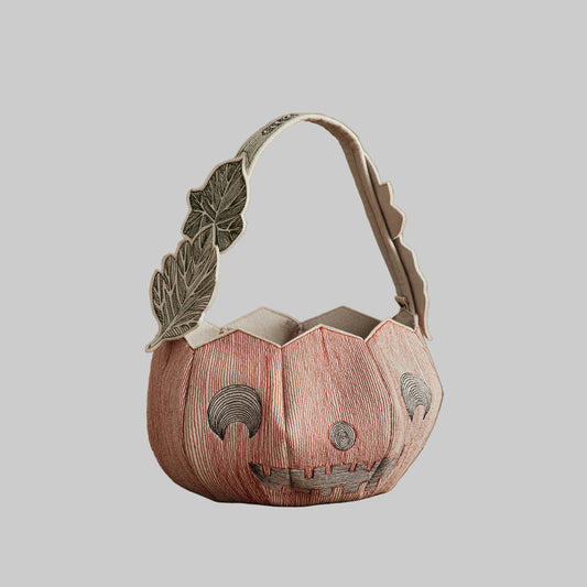 Coral and Tusk’s “Jack-o’-Lantern” embroidered felt basket for Halloween decor or trick-or-treating