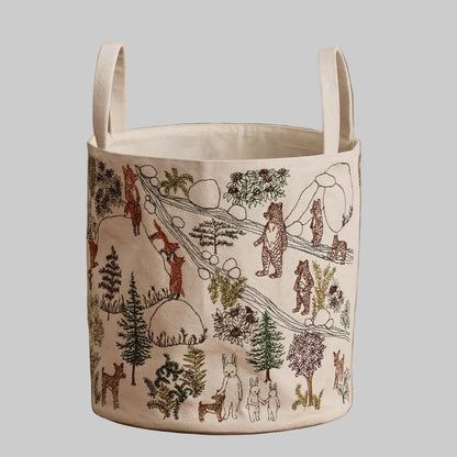 Coral and Tusk's embroidered "Forest Fun" canvas bag featuring designs of woodland creatures enjoying the forest
