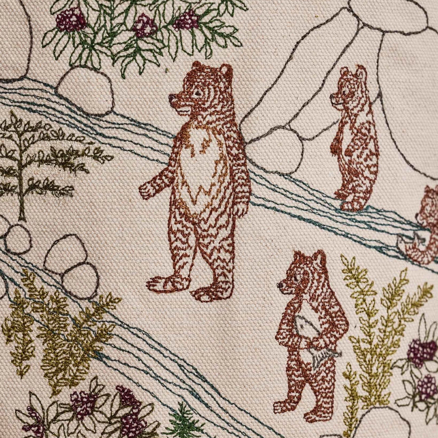 Coral and Tusk's embroidered "Forest Fun" canvas bag featuring designs of woodland creatures enjoying the forest