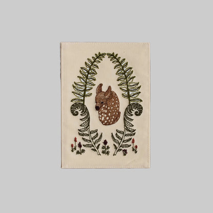 Coral and Tusk's "Fawn in Ferns" embroidered keepsake card featuring a baby deer nestled between greenery and florals