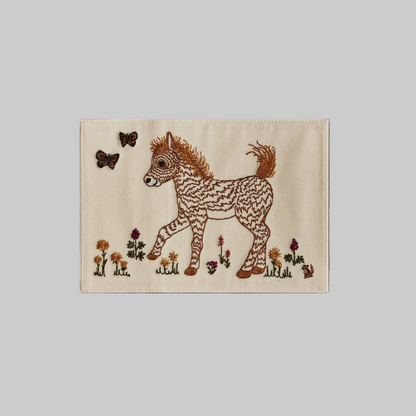 Coral and Tusk's "Prancing Pony" embroidered keepsake card  featuring a small horse and two butterflies