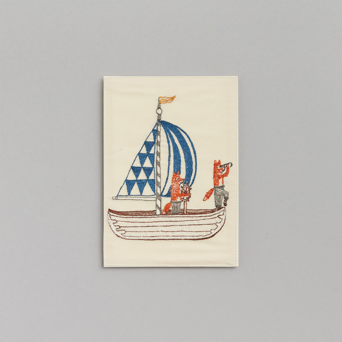 Coral and Tusk's "Sailboat" embroidered keepsake card  featuring two foxes sailing 