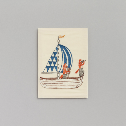 Coral and Tusk's "Sailboat" embroidered keepsake card  featuring two foxes sailing 