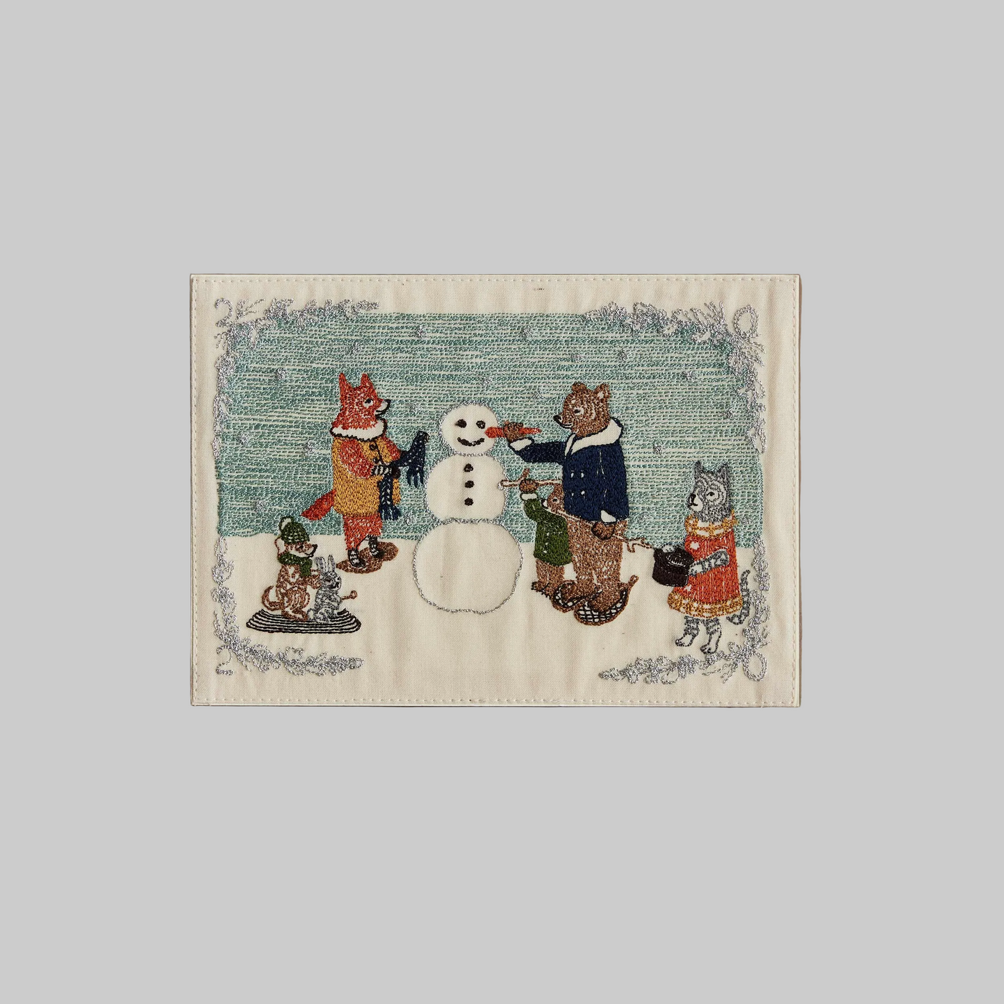 Coral and Tusk's "Snowman" embroidered keepsake card  featuring animals building a snowman