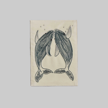Coral and Tusk's "Humpback Whales" embroidered keepsake card  featuring two whales swimming upward