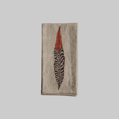 Coral and Tusk’s “Pheasant Feather” embroidered linen dinner napkin 