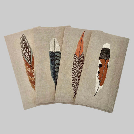Coral and Tusk’s feather themed embroidered linen dinner napkins