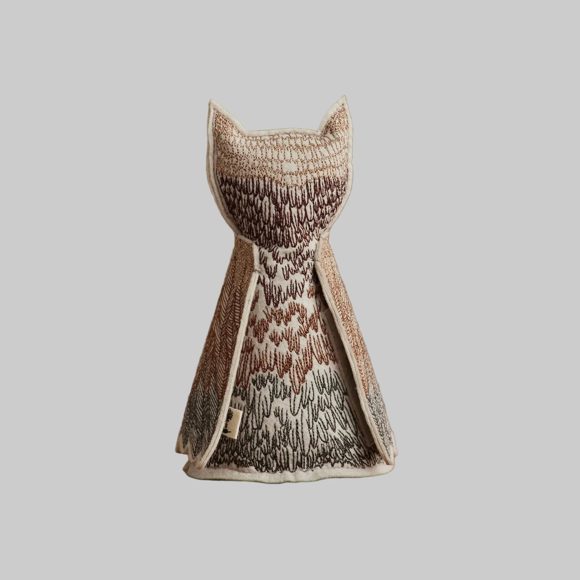 Coral and Tusk’s “Owlet of Curiosity” embroidered felt object, keepsake of gift