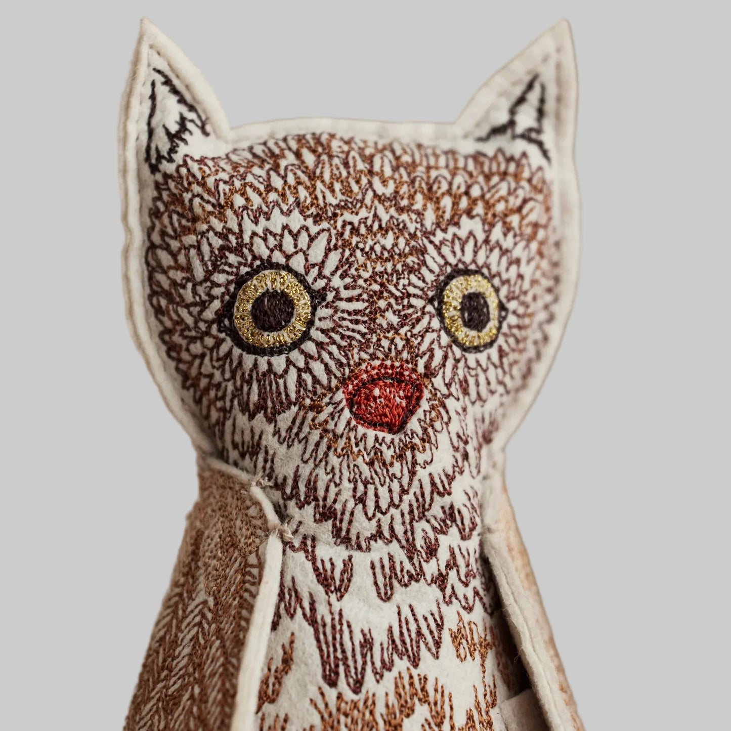 Coral and Tusk’s “Owlet of Curiosity” embroidered felt object, keepsake of gift
