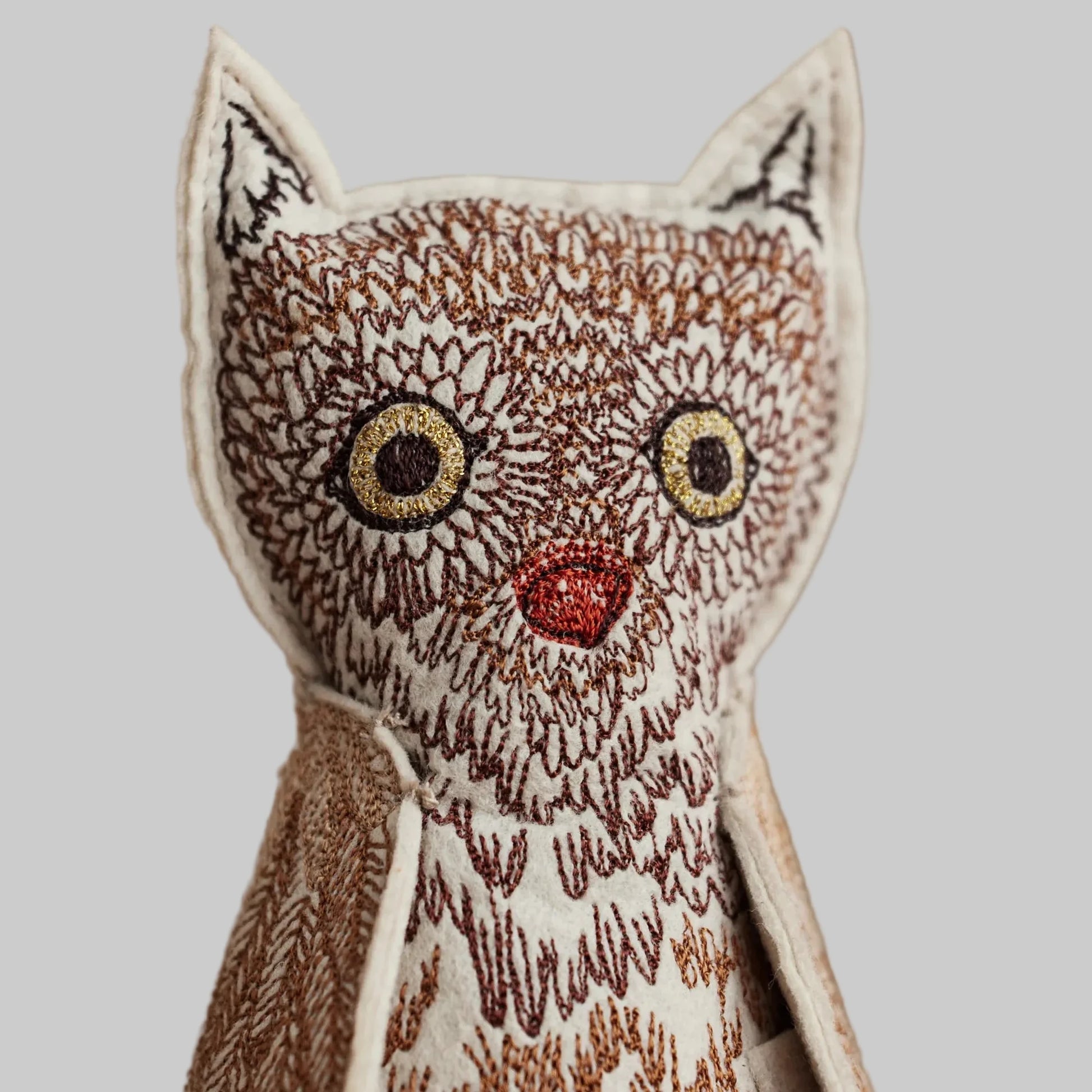 Coral and Tusk’s “Owlet of Curiosity” embroidered felt object, keepsake of gift