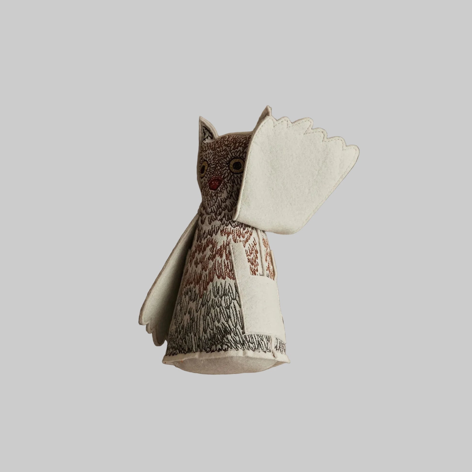 Coral and Tusk’s “Owlet of Curiosity” embroidered felt object, keepsake of gift