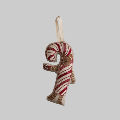 Coral and Tusk's "Candy Cane Dog" embroidered linen Christmas ornament featuring design of a brown dog dressed as a candy cane
