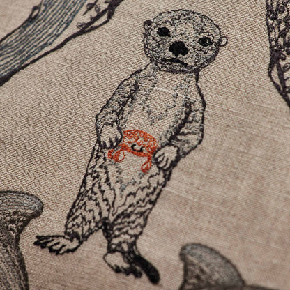 Coral and Tusk’s “Sea Friends” embroidered linen pillow featuring a variety of marine life found in oceans across the world, measures 16” x 16”