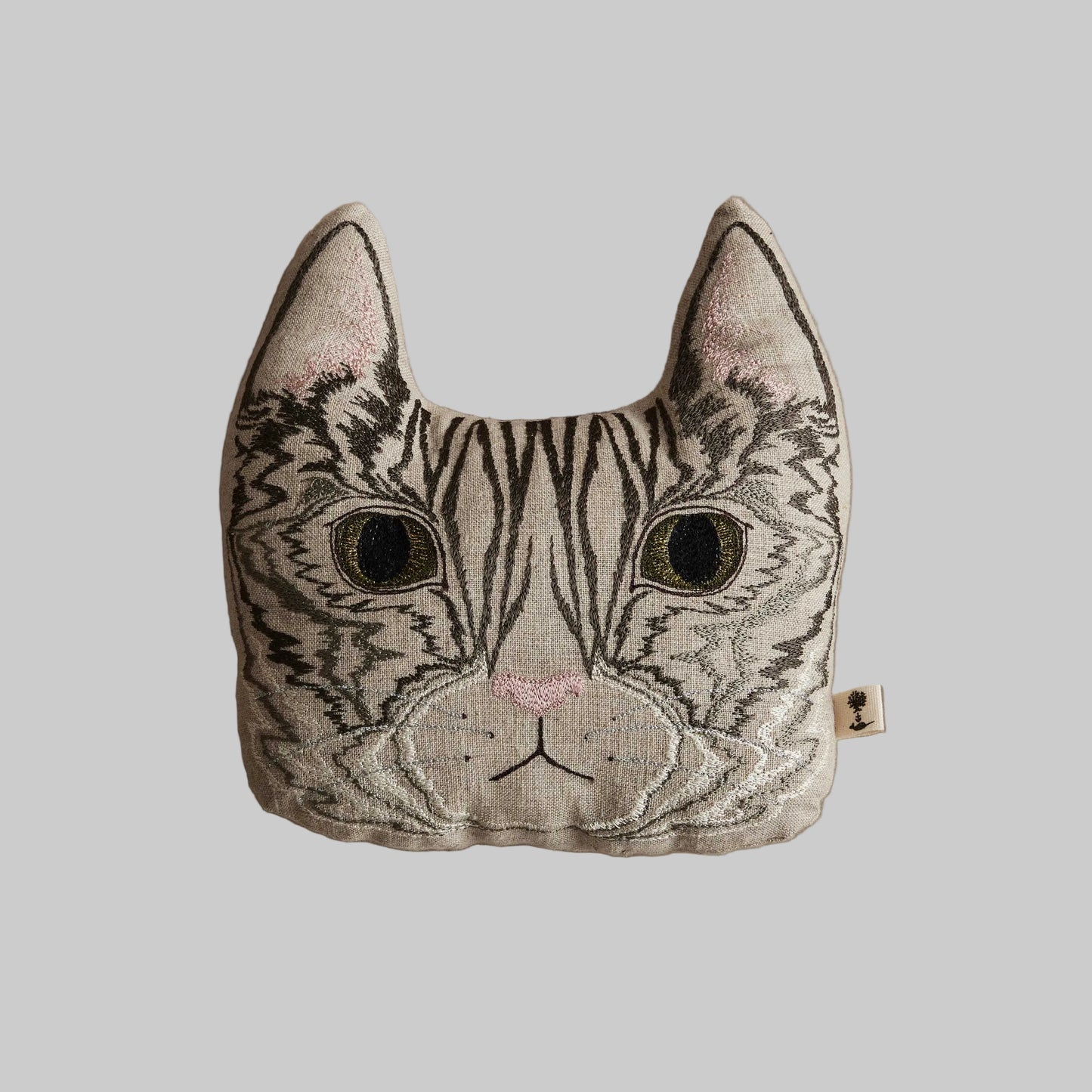 Coral and Tusk's "Tabby Cat" Cat-shaped pillow with embroidered face on 100% linen fabric
