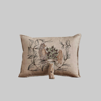 Coral and Tusk’s “Briar Bears” pocket pillow featuring a family of brown bears snacking on blackberries, measures 12” x 16”