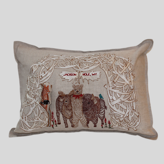 A Workshop x Coral and Tusk collaboration, this pillow features animal friends gathering for a photo under Jackson's iconic Antler Arch, measures 12" x 16"