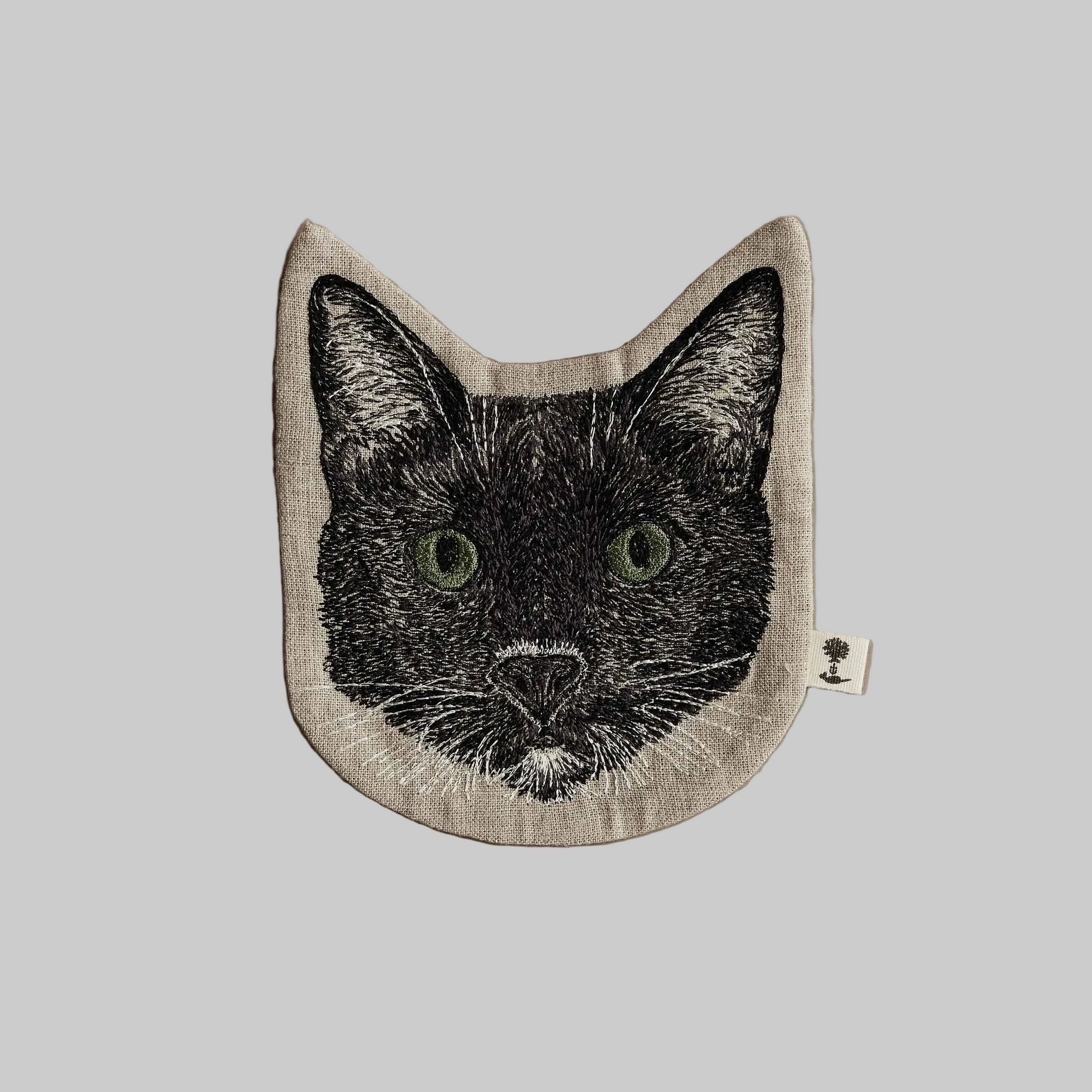 Coral and Tusk’s “Black Cat” embroidered linen pouch for coins or trinkets