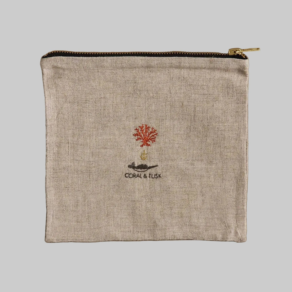 Coral and Tusk's embroidered linen "Explorers" pouch featuring a design of fox and bear friends prepared for an outdoor adventure